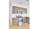 Contemporary kitchen showcasing stainless steel oven, microwave, subway tile backsplash and cabinets at 545 Wayton Cir, Moncks Corner, SC 29461
