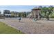 Community playground featuring a slide, swings, and spring riders for enjoyment at 545 Wayton Cir, Moncks Corner, SC 29461