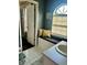 Inviting bathroom with arched window seating area, white vanity, and modern fixtures at 620 Saint Ives Ln, Goose Creek, SC 29445