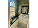 Charming bathroom featuring an arched window with a cozy seat cushion and white vanity at 620 Saint Ives Ln, Goose Creek, SC 29445