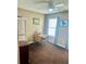 Bright bedroom featuring a ceiling fan, closet, and natural light from a window at 620 Saint Ives Ln, Goose Creek, SC 29445