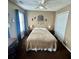 Comfortable bedroom featuring a ceiling fan, closet, and decor for a relaxing atmosphere at 620 Saint Ives Ln, Goose Creek, SC 29445