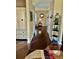 Inviting hallway showcasing hardwood floors and decorative accents, leading to a cozy living space at 620 Saint Ives Ln, Goose Creek, SC 29445