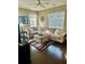 Spacious living room with a plush sectional, soft lighting, and a decorative rug, perfect for relaxation at 620 Saint Ives Ln, Goose Creek, SC 29445