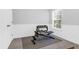 Basement workout room complete with weight rack, work out bench, and natural light from the window at 794 Hunt Club Run, Charleston, SC 29414