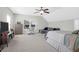 Spacious bedroom offering a comfortable seating area, a desk, and a large window with natural light at 794 Hunt Club Run, Charleston, SC 29414