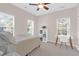 Sunlit bedroom with large windows, neutral decor, and ample space for a cozy and inviting atmosphere at 794 Hunt Club Run, Charleston, SC 29414