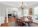 Formal dining area with hardwood floors adjacent to the living room at 794 Hunt Club Run, Charleston, SC 29414