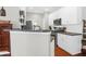 Bright kitchen featuring white cabinets, stainless steel appliances, and a stylish breakfast bar area at 794 Hunt Club Run, Charleston, SC 29414