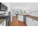 Gourmet kitchen with stainless appliances and adjacent dining area at 794 Hunt Club Run, Charleston, SC 29414
