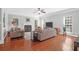 Spacious living room features a fireplace, hardwood floors and recessed lighting at 794 Hunt Club Run, Charleston, SC 29414
