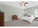 Spacious main bedroom with a tray ceiling, and carpet floor, offering a comfortable and inviting retreat at 794 Hunt Club Run, Charleston, SC 29414