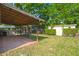 Backyard with brick patio, shed, and wood privacy fence at 8108 Halifax Way, North Charleston, SC 29420