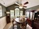 Dining room with high ceilings and view of the front yard at 8496 Roanoke Dr, North Charleston, SC 29406