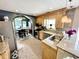 Well-lit kitchen features stainless steel appliances, granite countertops, and modern backsplash at 8496 Roanoke Dr, North Charleston, SC 29406
