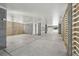 Spacious unfinished basement with concrete floor, support columns, and natural light at 9017 Stern Aly, Johns Island, SC 29455