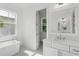 Bright bathroom features a soaking tub, sleek vanity, and window views at 9017 Stern Aly, Johns Island, SC 29455