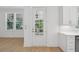 Bright entryway with tile floors, white walls, and plenty of natural light from the windows at 9017 Stern Aly, Johns Island, SC 29455
