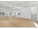 Bright and airy living room with hardwood floors, and abundant natural light at 9017 Stern Aly, Johns Island, SC 29455
