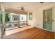 Enjoy the fresh air on this covered porch featuring wood floors, and stylish railings at 9017 Stern Aly, Johns Island, SC 29455