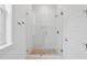 Bright bathroom featuring a glass enclosed shower with white subway tile at 9017 Stern Aly, Johns Island, SC 29455