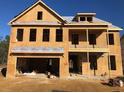 Two story house under construction with a large balcony at 173 Fiddleback Dr, Summerville, SC 29486