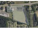 Aerial view of property with dimensions, near residential area at 1501 Central Ave, Summerville, SC 29483