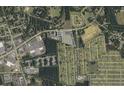 Aerial view showing property size and location near residential area at 1501 Central Ave, Summerville, SC 29483
