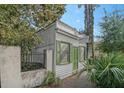 Quaint white house with green shutters and a small sign at 190 Coming St, Charleston, SC 29403