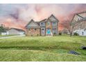 Two-story house with stone accents and a teal front door, wide angle at 1713 Pimlico Blvd, Moncks Corner, SC 29461