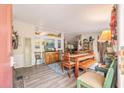 Cozy dining area showcases stylish décor, wood table, and hardwood floors at 2991 Blackfish Rd, Johns Island, SC 29455