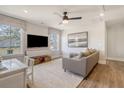 Versatile bonus room with large windows, media center, and comfortable seating at 113 O'Leary Circle, Summerville, SC 29483