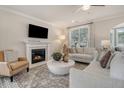 Inviting living room features a fireplace, large windows and stylish decor at 113 O'Leary Circle, Summerville, SC 29483