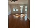 Spacious living room featuring hardwood floors and sliding glass doors to a deck at 170 Willowbend Ln, Summerville, SC 29485