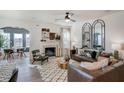 Bright living room featuring a fireplace, stylish decor, and comfortable seating for relaxation and entertainment at 144 Seaton Street, Summerville, SC 29486