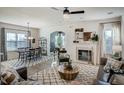 Spacious living space with dining area, fireplace, and stylish furnishings, offering a welcoming atmosphere at 144 Seaton Street, Summerville, SC 29486