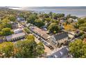 Aerial view of waterfront town with a mix of homes and businesses at 436 Church St, Mount Pleasant, SC 29464