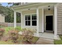 Front entrance with columns, and access to the home at 1625 Pimlico Blvd, Moncks Corner, SC 29461