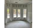 Bright living area featuring a bay window and high ceilings at 1081 Irving Manigault Rd, McClellanville, SC 29458