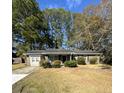 Ranch style home with mature trees and a spacious yard at 112 Beatrice Ln, Summerville, SC 29485