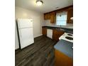 Kitchen with wood cabinets, new flooring, and appliances at 112 Beatrice Ln, Summerville, SC 29485