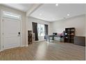 Bright entryway with hardwood floors and home office at 440 Coopers Hawk Dr, Summerville, SC 29483