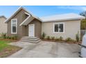 Newly constructed home with a clean, modern design and a well-maintained front yard at 5344 Sea Watch Lane, North Charleston, SC 29406