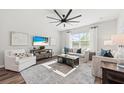 Living Room with hardwood floors, comfortable seating, and large windows at 752 Meadowbrook Ln, Summerville, SC 29486