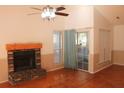 Spacious living room with a fireplace and hardwood floors at 201 Regent St, Summerville, SC 29483