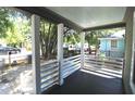 Bright and airy front porch overlooking the neighborhood at 2744 E Surrey Dr, North Charleston, SC 29405