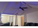 High-ceilinged living room with ceiling fan, and view of adjacent dining area at 303 Longleaf Rd, Summerville, SC 29486