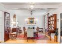 Elegant dining room featuring a formal table, chandelier, and hardwood floors at 79 Alexander St, Charleston, SC 29403