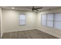 Spacious bedroom with hardwood floors and large windows at 114 Groves St, Walterboro, SC 29488
