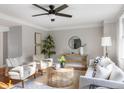 Bright and airy living room with hardwood floors and comfortable seating at 1216 Taliaferro Ave, Charleston, SC 29412